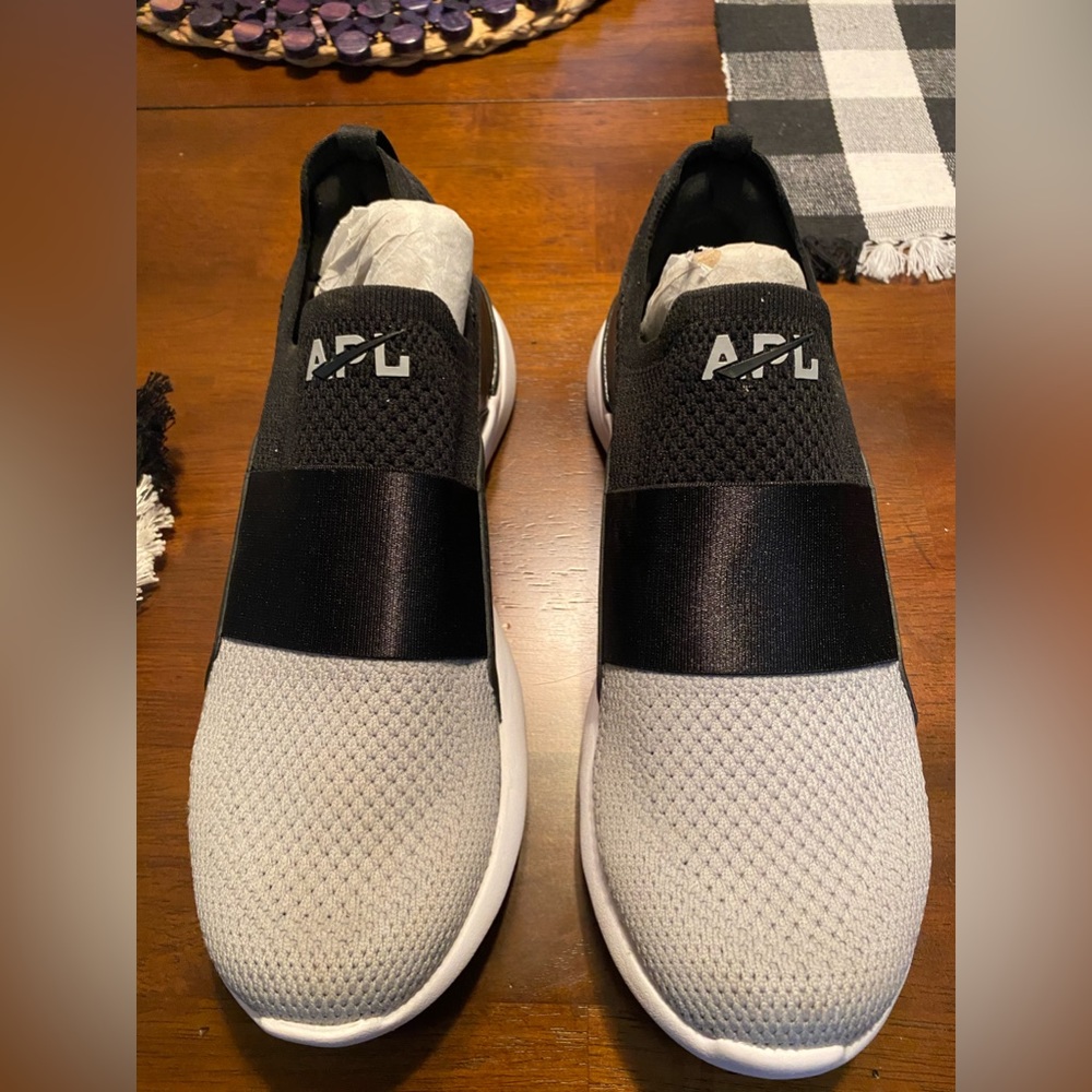 Brand new Never worn APL athletic slip on shoes